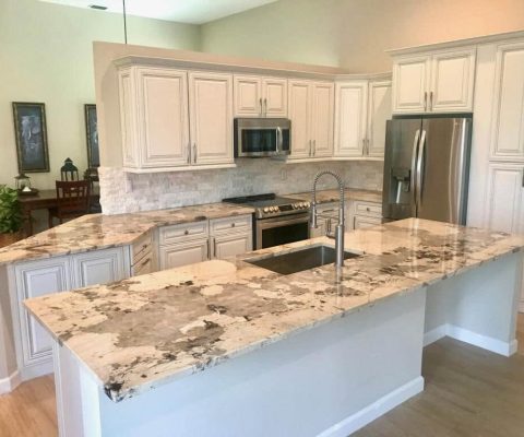 Luxurious kitchen renovation in Palm Beach featuring elegant marble countertops, custom cabinetry, and modern stainless steel appliances. Perfect for high-end home remodeling and bespoke kitchen design.
